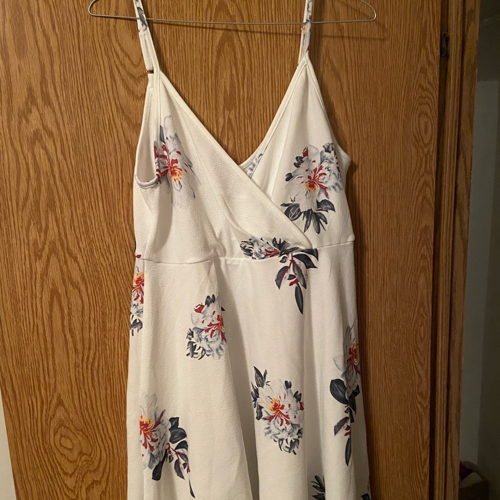 Short flared white floral belted dress